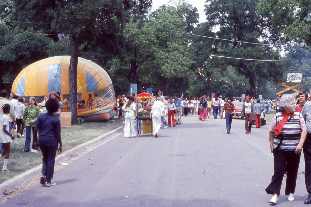 1973 Mayfest - crowd, bounce house